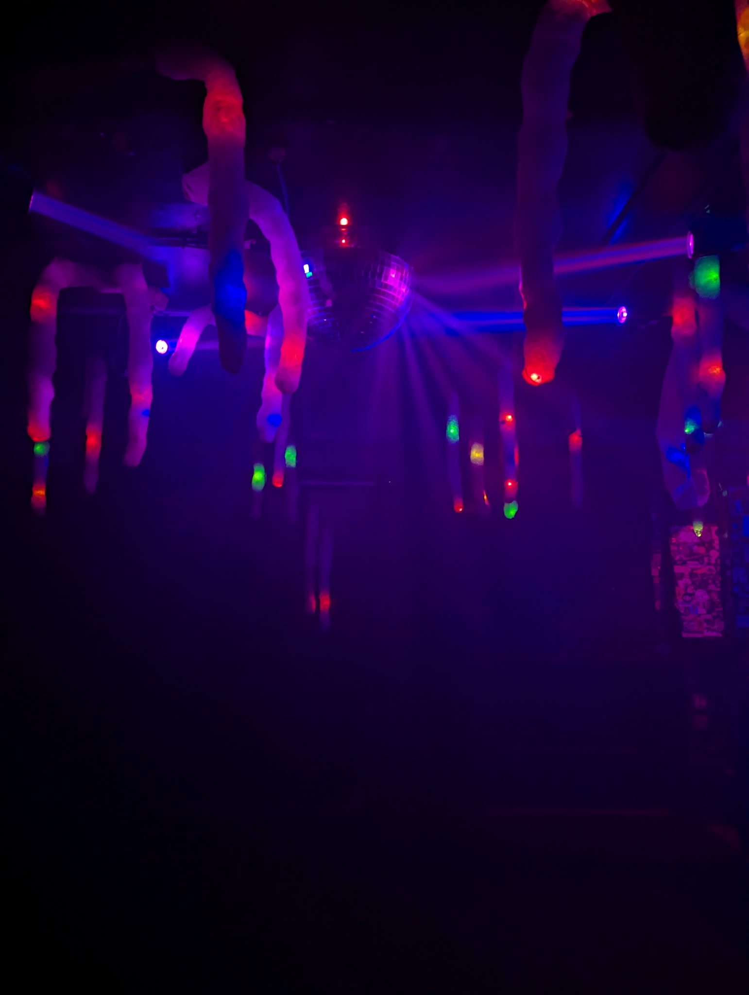Stalactites and the mirror ball under blue light