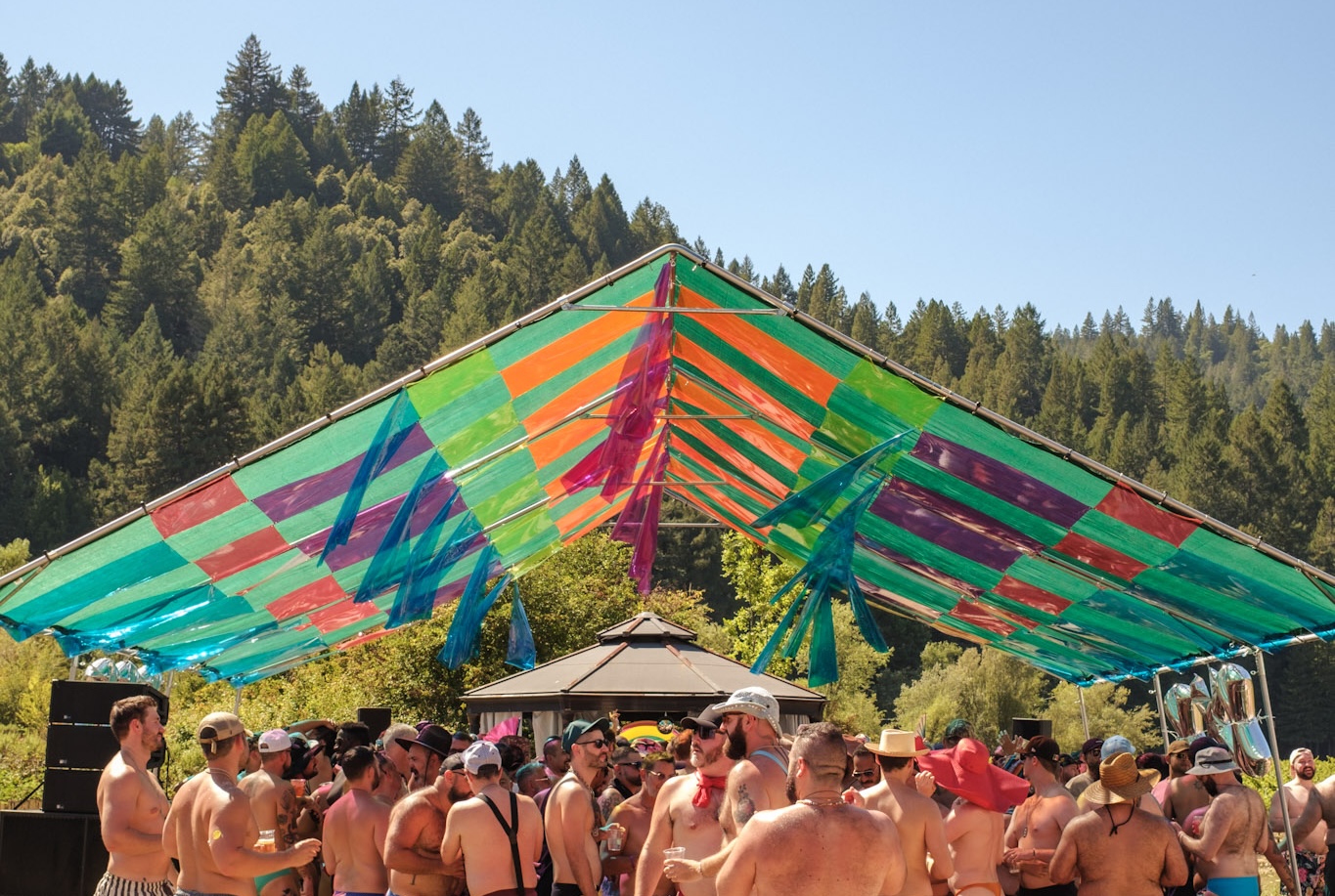 The plaid canopy over the dancefloor with redwood hills behind